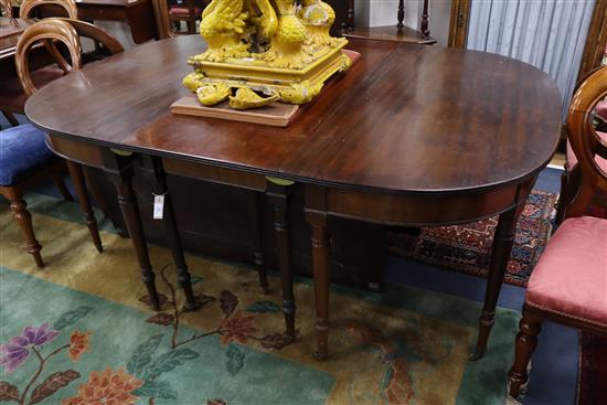 A late Georgian mahogany extending dining table W.284cm